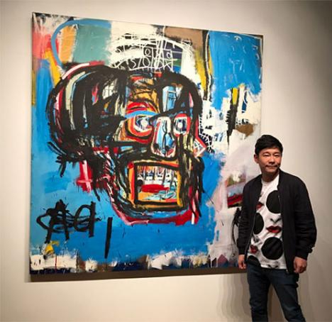 Yusaku Maezawa posant devant son tableau de Jean-Michel Basquiat acheté 110,5 M$ en mai 2017 © Photo Yusaku2020